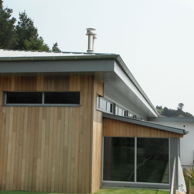 Illustration of eaves on a modern home with wooden cladding.