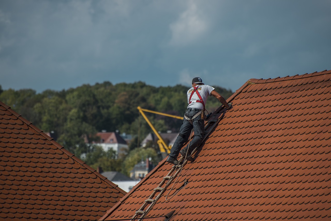 Roofers building a pitched roof