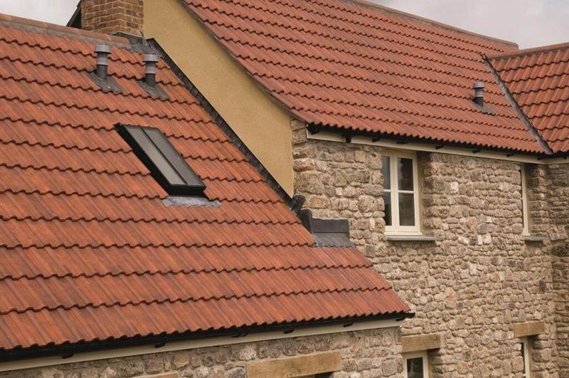 Chilton Red Double Roman roof tiles on a pitched roof