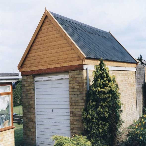 shed with felt roof panels