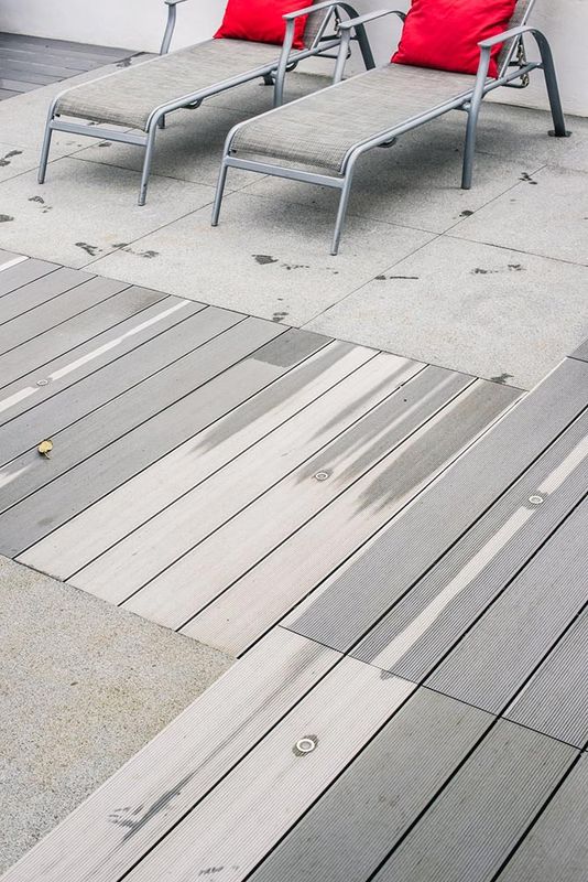 Cladco composite decking with sun lounges